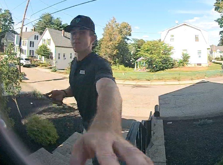 Delivery person on my Wyze doorbell cam (still shot)