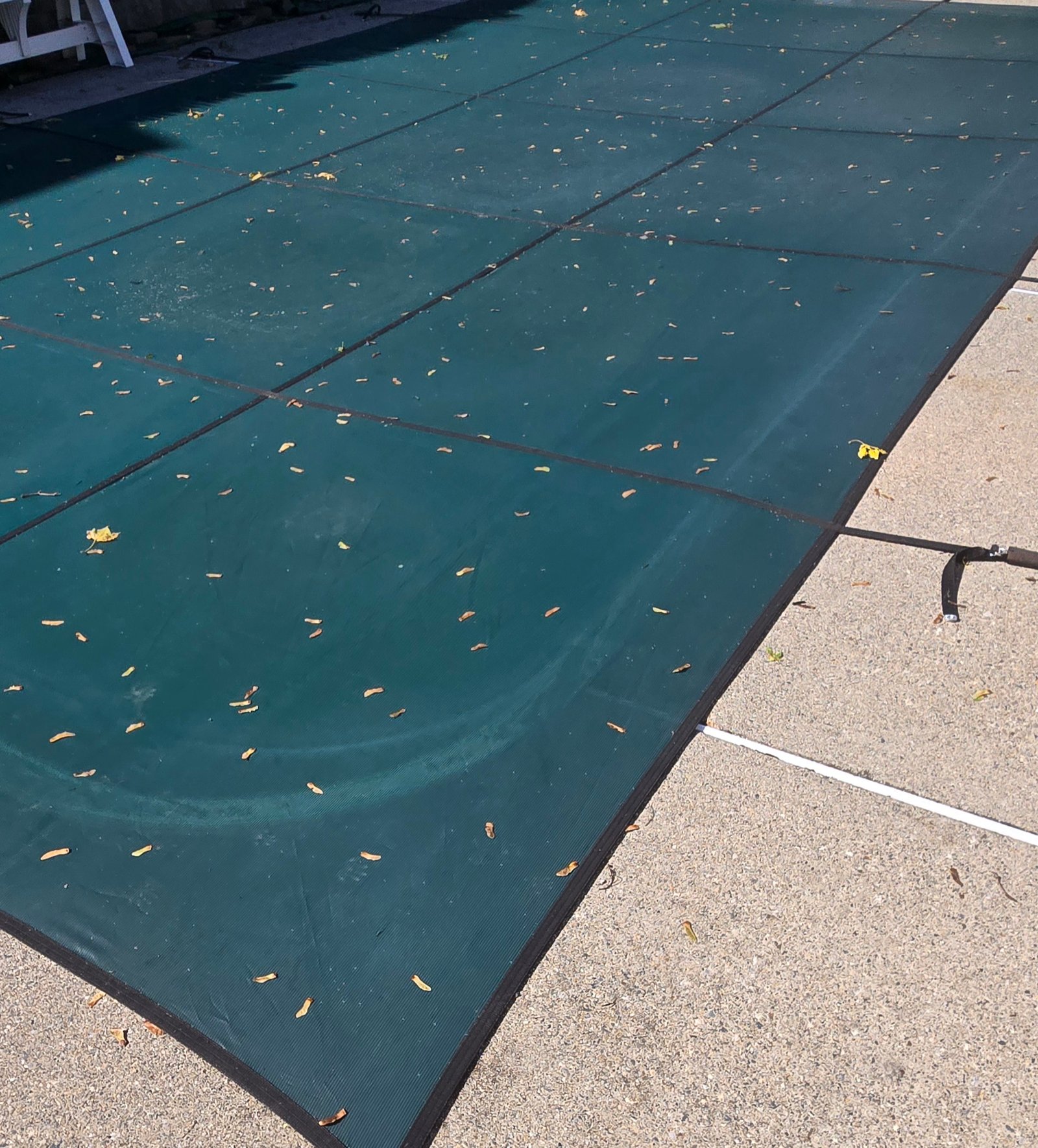 Pool cover over pool after closing